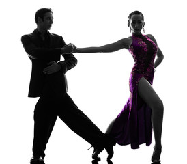 couple man woman ballroom dancers tangoing  silhouette