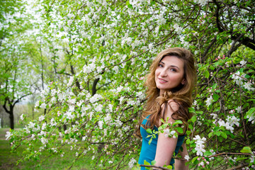 Beautiful young woman with flowers.