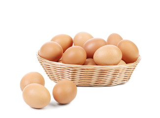 Brown eggs in the basket.