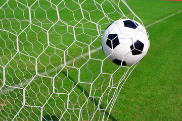 Fototapeta na wymiar soccer ball in goal