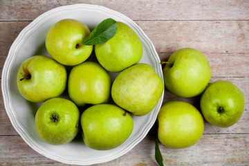 fresh green apples in plate