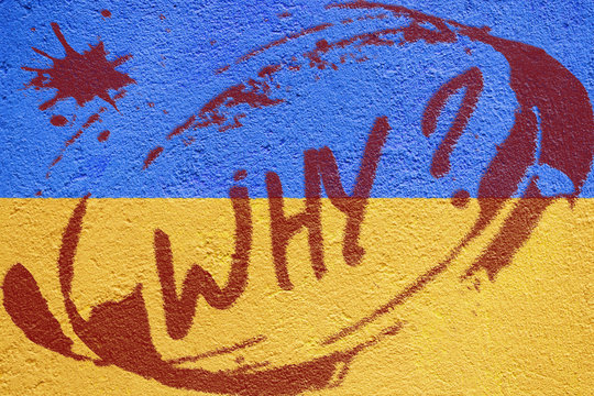 Ukraine flag painted on old concrete wall with RIOT inscription