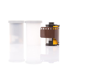35mm still camera film cartridge over white background