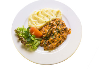 goulash with vegetable sauce and mashed potatoes