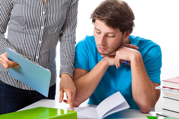 Teacher pointing student's mistake