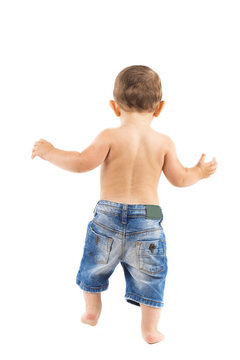 Portrait Of Standing Little Baby Boy On A White Background