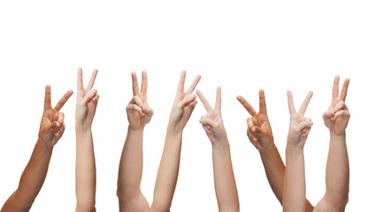 human hands showing v-sign