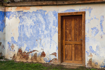 Wall with the entrance door