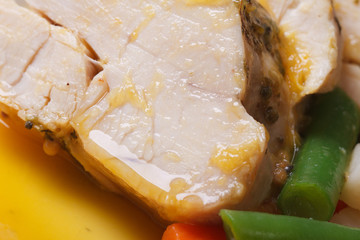 Oven baked chicken fillet with orange sauce