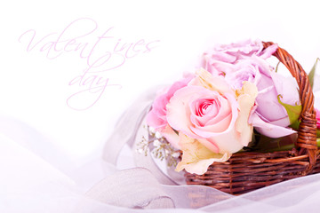 pink roses in brown basket for withe background