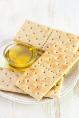 toasts with olive oil on white plate