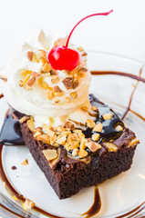 Chocolate brownie icecream and cherry