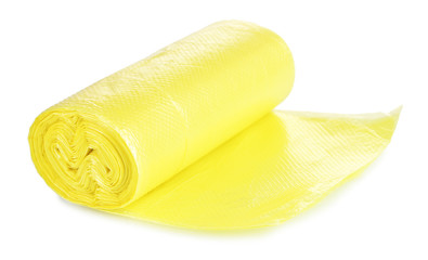 Roll of yellow garbage bags isolated on white