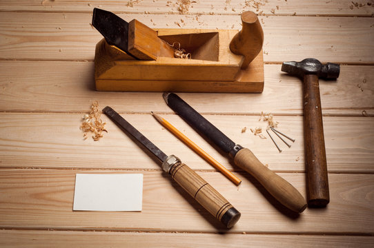 Desk of a carpenter with some tools