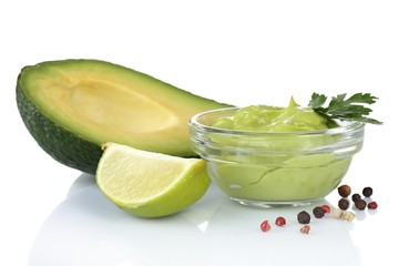 Fresh guacamole in bowl isolated on white © Africa Studio