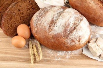 Composition with rye bread on table close up