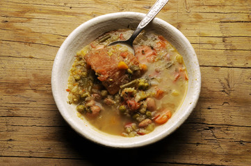 Minestra con crosta di formaggio grana Soup with cheese crust
