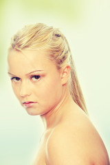 Fototapeta premium Close-up of beautiful woman face, over white background