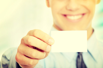 Business man with blank business card