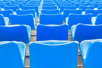Naklejka premium Empty dark blue chairs at the football Stadium