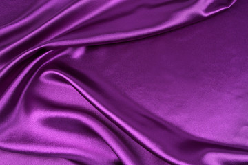 Purple silk fabric texture background. Copy space