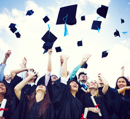 Fototapeta Graduation Caps Thrown in the Air obraz