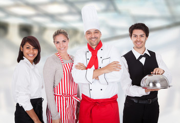 Group of chef and waiters