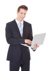 Businessman Holding Laptop