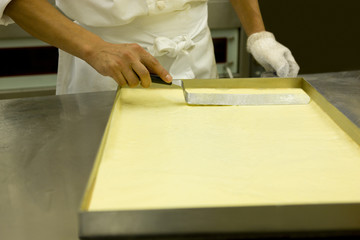 Patissier making pastry
