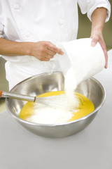 Obraz na płótnie Canvas Patissier making pastry