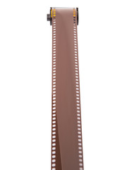 35mm still camera film cartridge over white background