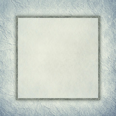 Blank sheet in picture frame on crumpled paper background