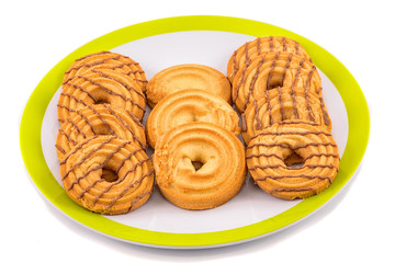 crackers in plate on white background