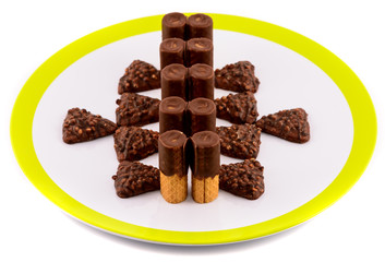 chocolate cookies on plate isolated on white