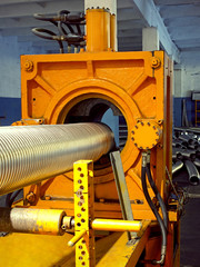 Metal corrugation forming machine.