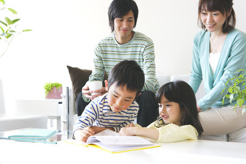 family sitting happily circle in living