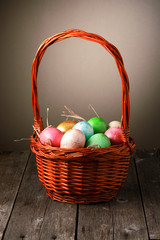 Colored easter eggs in basket