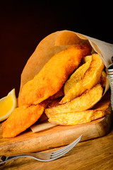 Fish and chips wrapped in paper