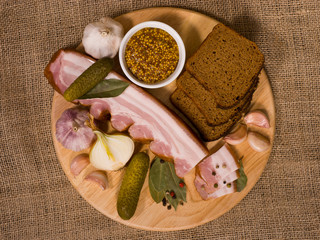 Still Life: Bacon Appetizer on Round Wooden Board