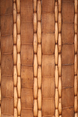 Closeup of yellow wicker basket.