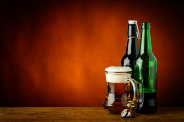 Mug and bottles of beer