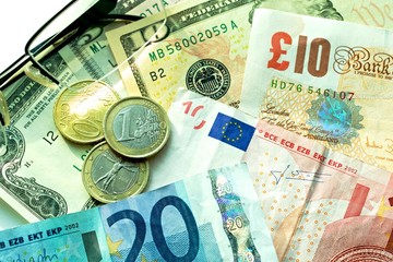 Banknotes: dollar, euro, british pound sterling, euro cents.