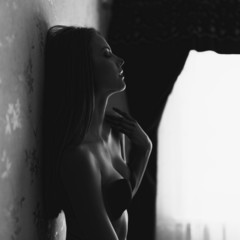 Black and white fashion portrait of a beautiful girl