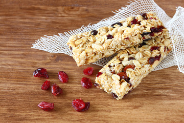 Fototapeta premium granola bar or energy bar on wooden background