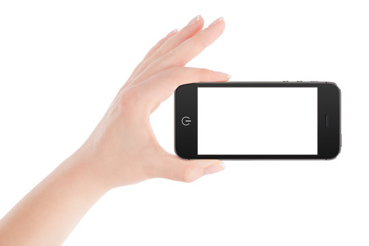 Female hand holding black smartphone in landscape orientation