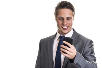 Attractive young businessman  on cellphone