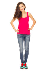 Fototapeta premium Young sporty girl in blue jeans