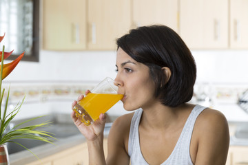 Attractive woman having breakfast