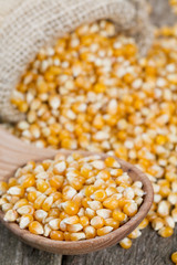 corn in wooden spoon