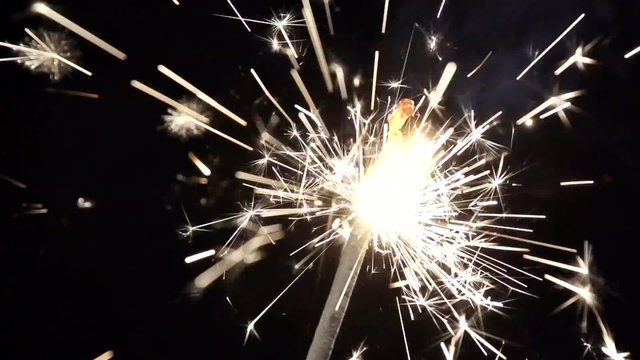 beautiful sparkler on black background in slowmotion